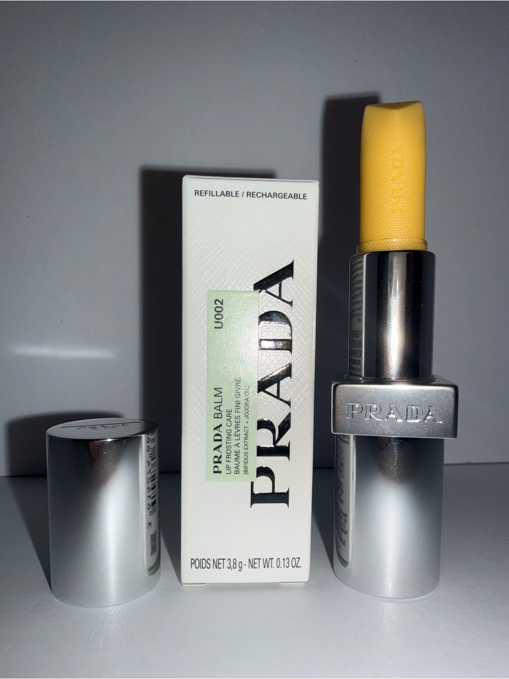 Prada Lip Balm Stick – U002 Banana Yellow Moisturizing Tint
